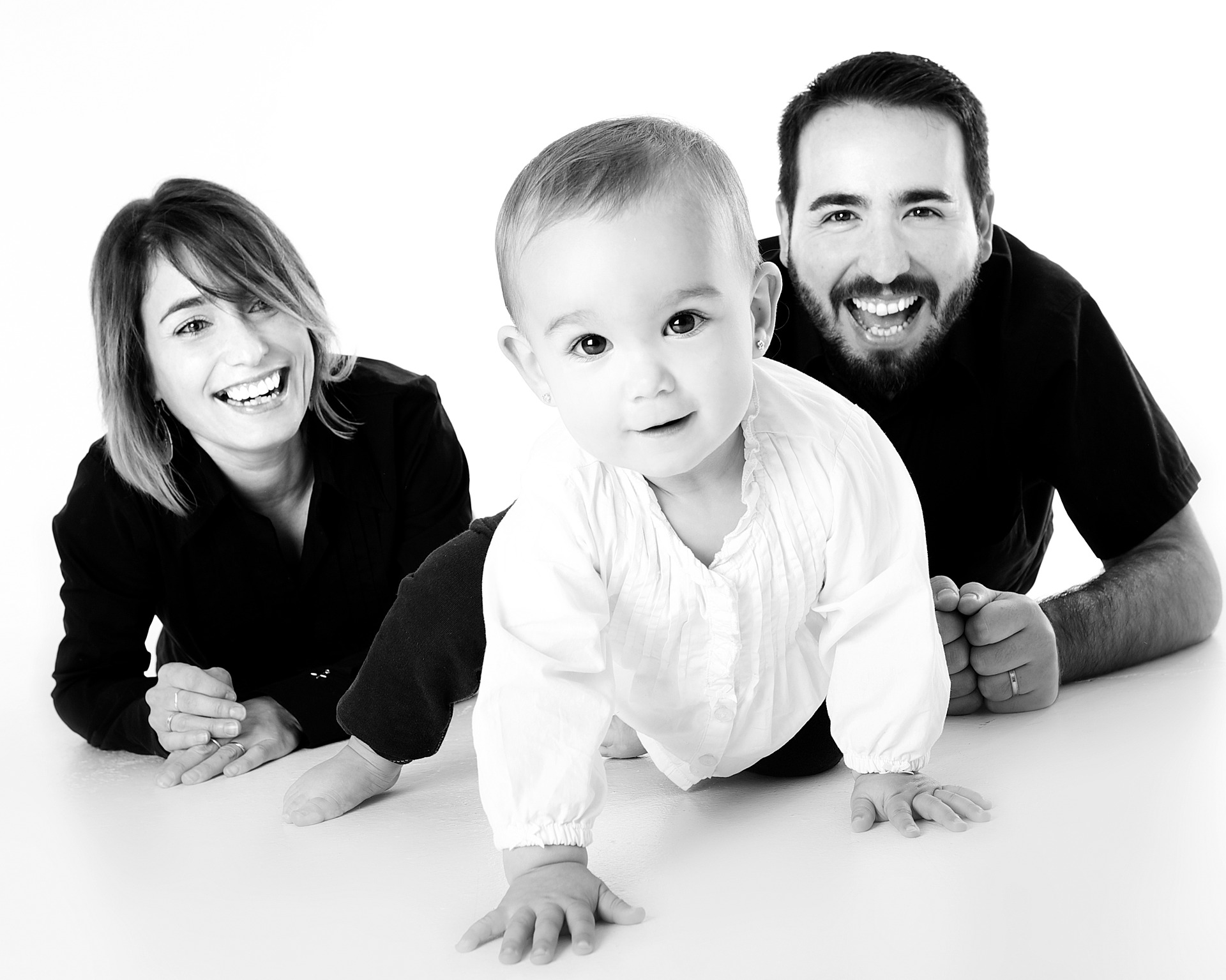 Mother, Father, and Baby Crawling