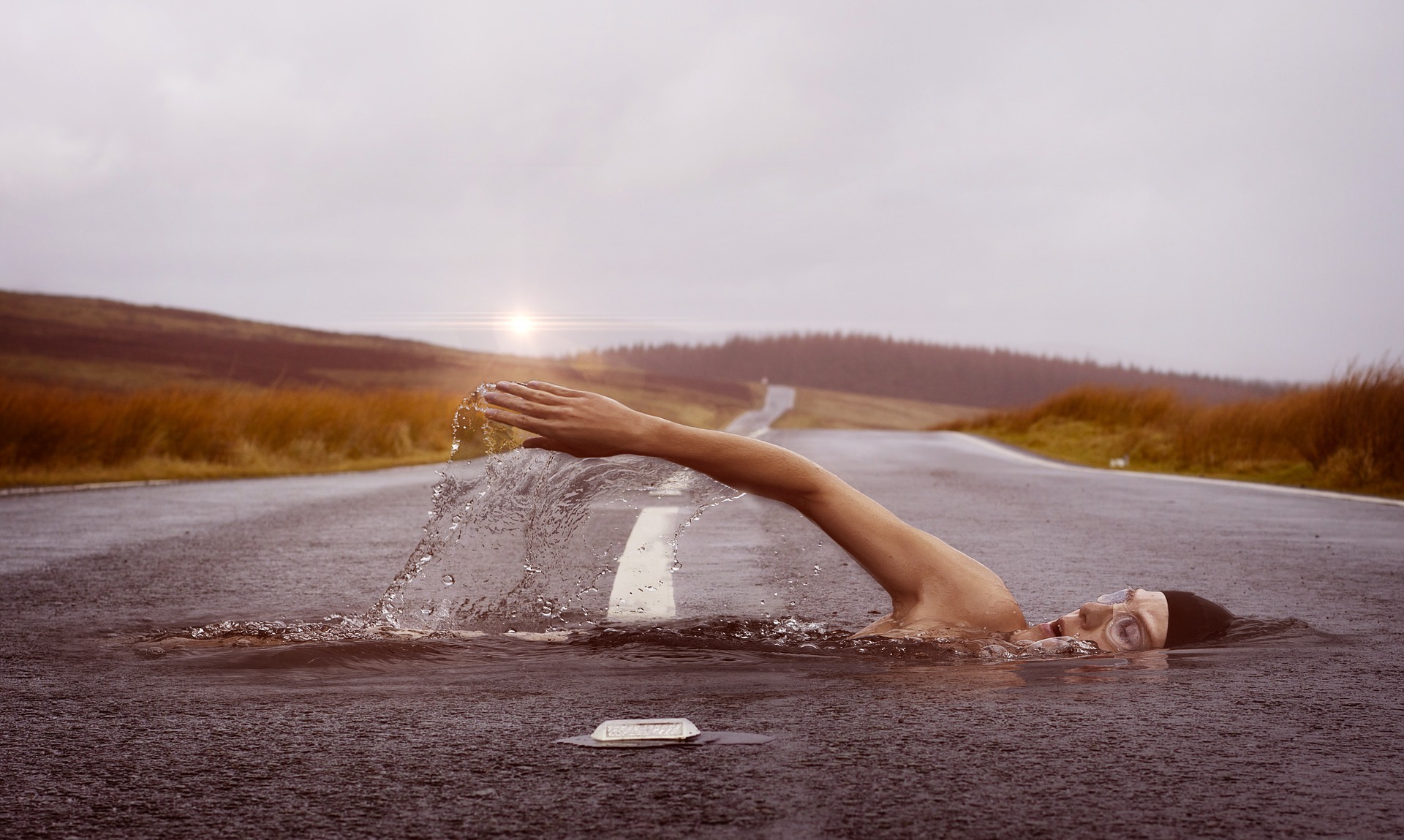 Image of Someone Swimming in a Road